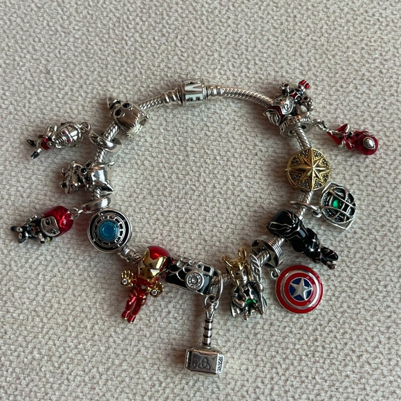 Pandora Jewelry - AUTHENTIC Marvel Pandora Bracelet with New charms and Rare Retired charms!